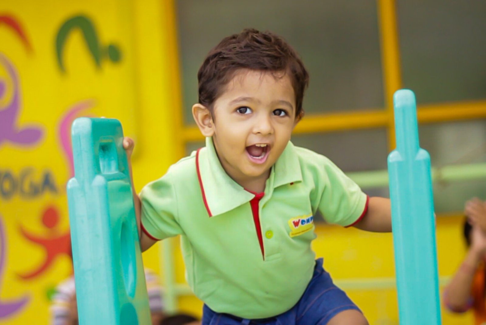 Young Boy Playing on Playground